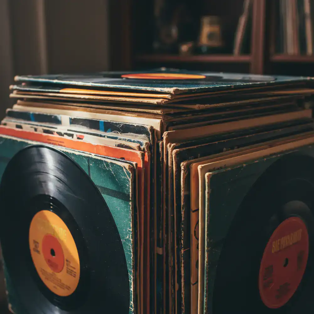 Vintage vinyl records stacked tightly together